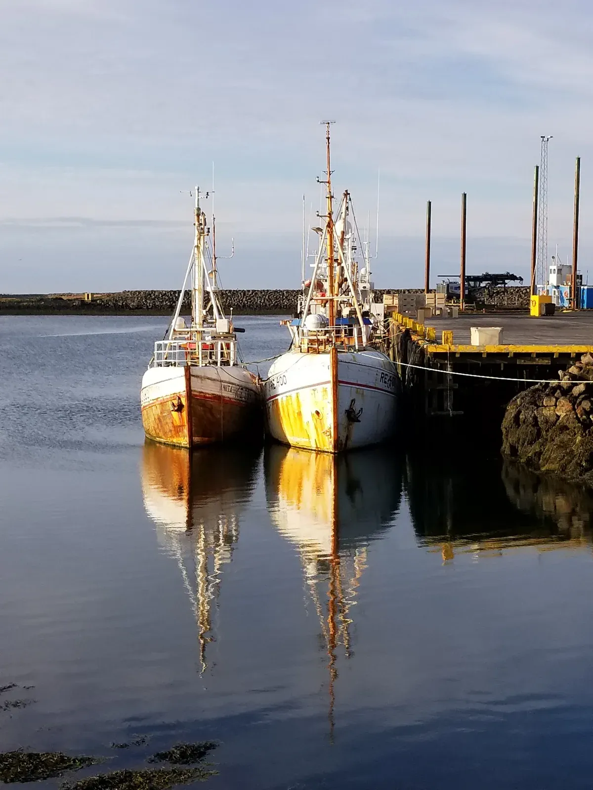 Fishing boats in Grindavík harbour, the coastal town near Fagradalsfjall volcano tours, Iceland