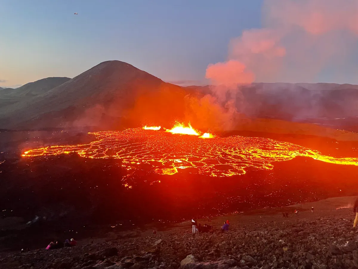 Lava filling the Meradalir valley during the 2022 eruption, the cooled field a Fagradalsfjall volcano tour now walks beside, Reykjanes, Iceland